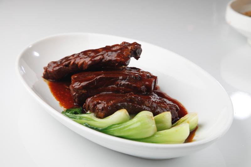 Braised Spare Ribs in Wuxi Style 無錫排骨 · Lightly browned in fat and then cooked slowly in a closed pan with a small amount of liquid.