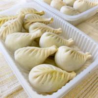 Frozen Steamed Vegetable Dumpling  急凍素菜蒸餃 · 1 bag (20 pieces) of frozen/uncooked Steamed Vegetable Dumpling  to make at your own conveni...