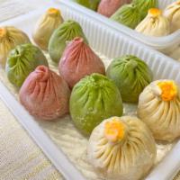 Frozen Garden Special Soup Dumplings · 1 bag (20 pieces) of frozen Garden Special Soup Dumplings. Contains 3 kinds of Shanghai You ...