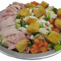 Chef Salad · Ham, turkey, black olives, tomatoes, cheddar cheese and croutons.