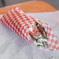 Gyro Sandwich · Tzatziki sauce, tomatoes, red onions. Add feta for an additional charge.