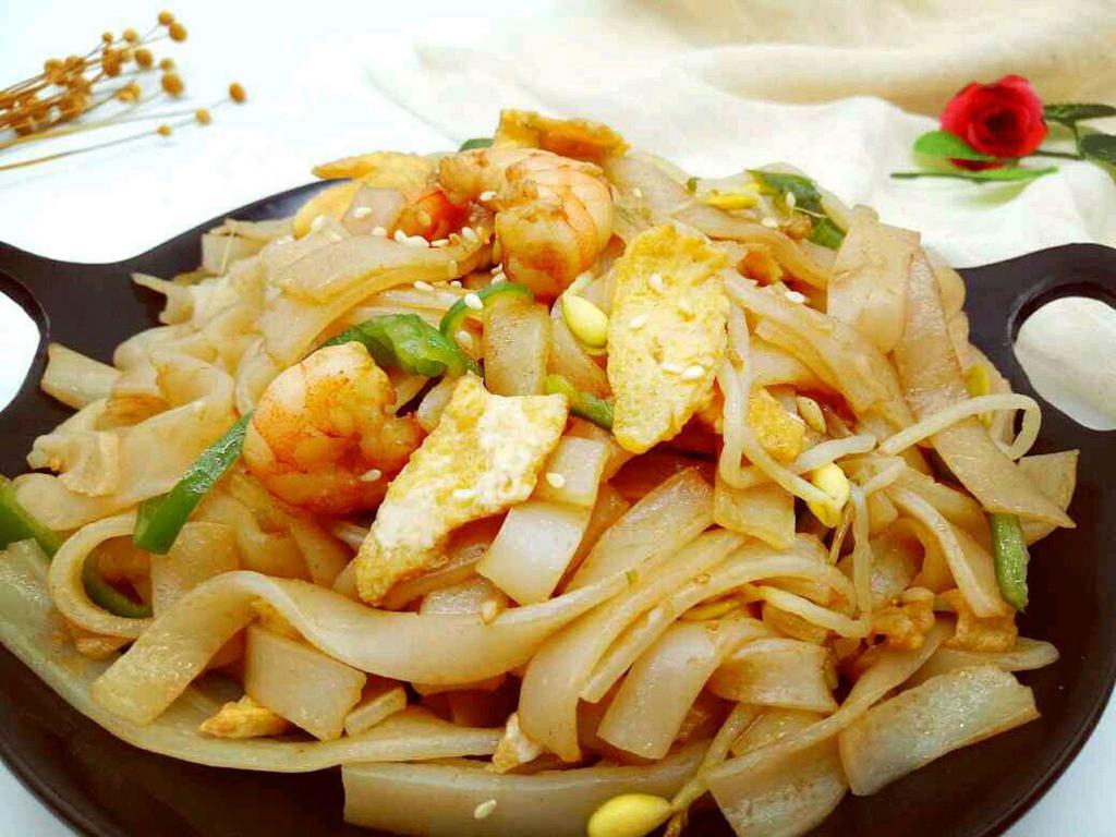 Shrimp Chow Fun · Stir fried vegetables and noodles.