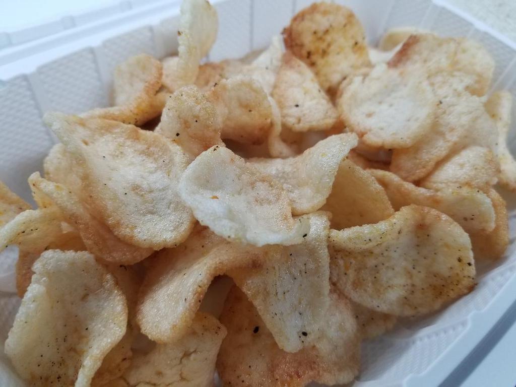 Shrimp Chips · Made to order shrimp chips seasoned with Karai Crab's secret cajun recipe.