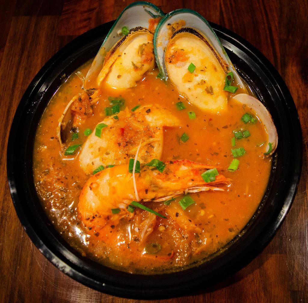 Cioppino · A hearty San Francisco style fisherman’s stew with crab, shrimp, clams, mussels, and fish! Dairy free. Gluten free.