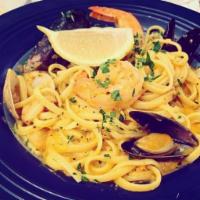 Seafood Pasta · Linguini with shrimp, scallops, clams, and mussels served in a rich, house-made tomato and f...
