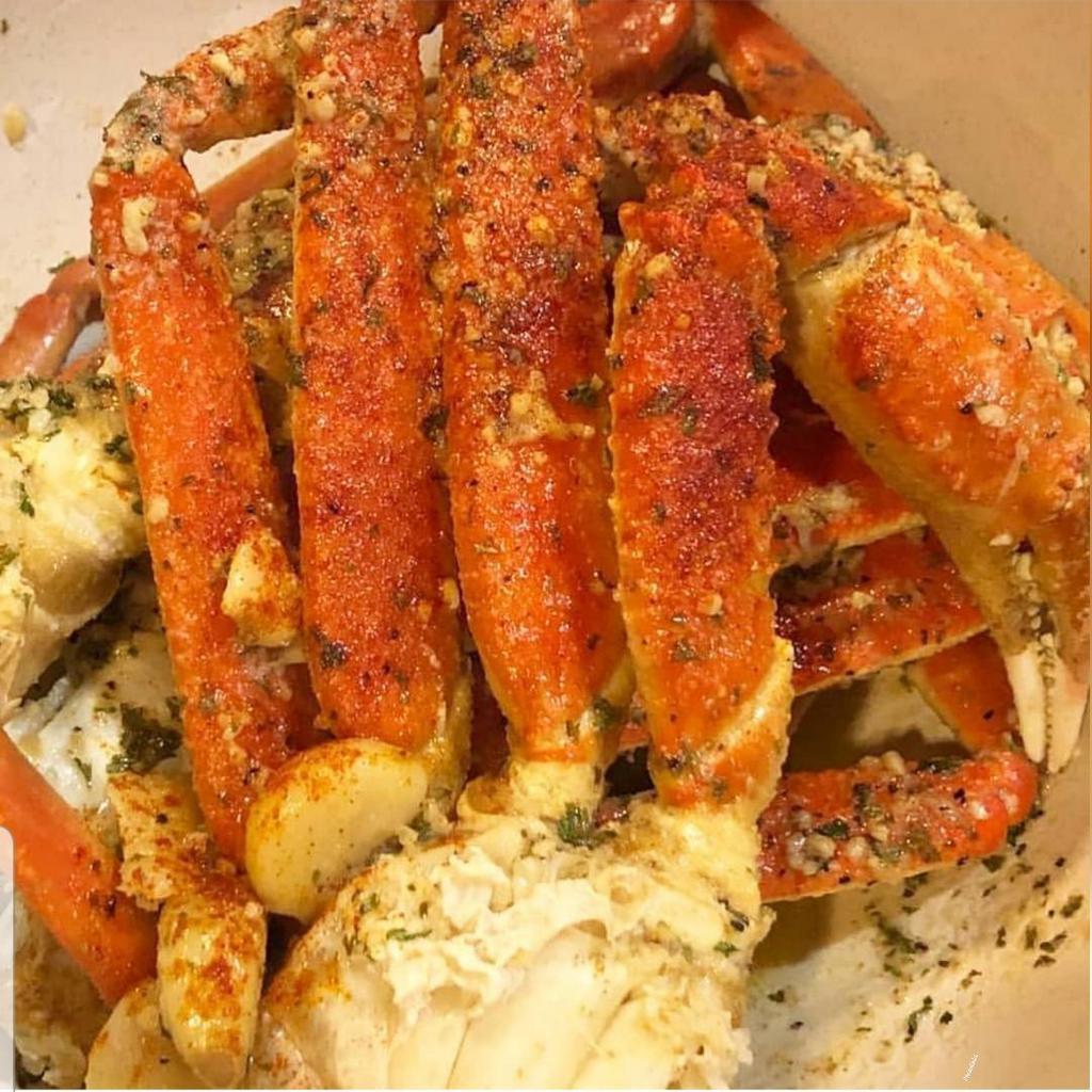 Snow Crab legs · 1.25 pounds of snow crab legs steamed and dressed with your choice of one of our famous sauces!
