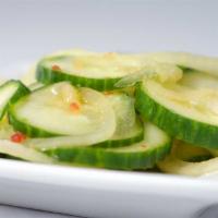 Cucumber Salad · Sliced cucumber with ponzu sauce.