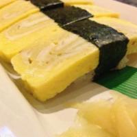 Tamago Nigiri · Cooked. Egg omelet. 