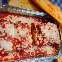 Family Homemade Lasagna · For a family of Four.Homemade recipes. Baked with a trio of cheese.Served with 6'' (Six piec...
