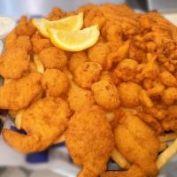 Seafood Platter · Serves 2 person .Comes with  New England clam strips, 6 large butterflied shrimp, 2 tilapia ...