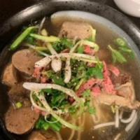 P1. Pho Dac Biet · Steak, brisket, tendon, tripe, and meatball combo noodle soup.