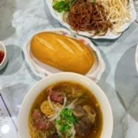 B11. Bun Bo Hue · Spicy beef and pork noodle soup.