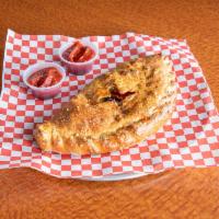 Calzone · Our delicious dough wrapped around sauce, cheese and up to 3 toppings of your choice. Choose...