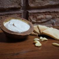 Musto Musier · Homemade thick and drained yogurt infused with shallots.