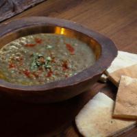 Adasi Soup · Lentils prepared with Persian herbs .