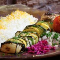 Veggie Kabob · A skewer of charbroiled green peppers, onion, zucchini, mushrooms .