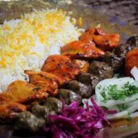 Chicken Soltaani · A combination of a chicken kabob skewer (breast or thigh) and a skewer of koobedeh (beef or ...