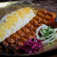 chicken koobideh · One skewer mixed of fresh ground chicken  prepared with onion , herbs and spices, served wit...