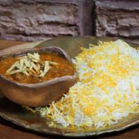 Gheymeh Bodemjan · Eggplant stew with sautéed onion, diced beef, and yellow split peas prepared in a saffron to...