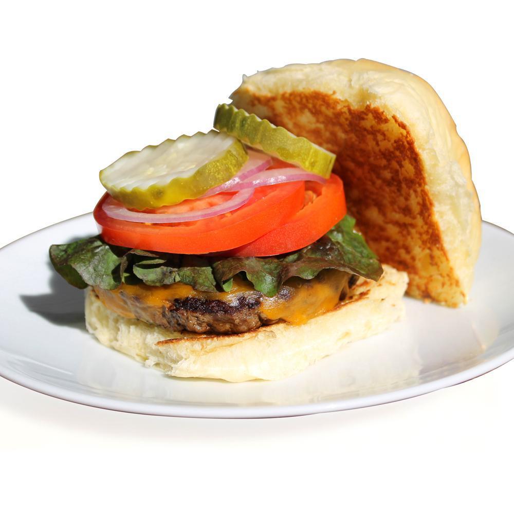Veggie Burger · A plant based patty seared on a flat top with a fresh griddled Breadworks brioche bun.  Choice of Cheddar, American, Pepper Jack, Swiss or American cheese.  Fresh sliced tomato and red onion, dill pickle,  and red leaf lettuce on the side.