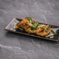 A5. Salt and Pepper Wings · Fried chicken wings tossed with salt, pepper, jalapenos, scallions and onions.