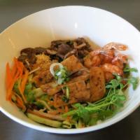 B. Vermicelli Bowl · Choice of grilled meat and egg roll in thin rice noodles served with fresh lettuce, cucumber...