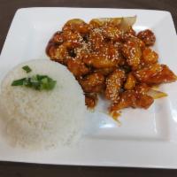 C8. Sesame Chicken Platter · Battered and fried, coated in a sweet orange-flavored chili sauce caramelizes to a glaze and...