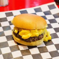 Macaroni and Cheese Burger · Topped with macaroni and cheese.