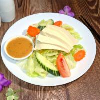 Tofu Salad · Tofu, cucumber, lettuce, tomato cabbage and carrot with sesame soy dressing.
