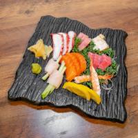 Sashimi Deluxe · 18 pieces of chef’s choice sashimi. Raw.