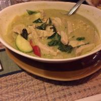 30. Green Curry Duck · Sliced boneless roasted duck in spicy green curry with bamboo shoot, Japanese eggplant,
zucc...