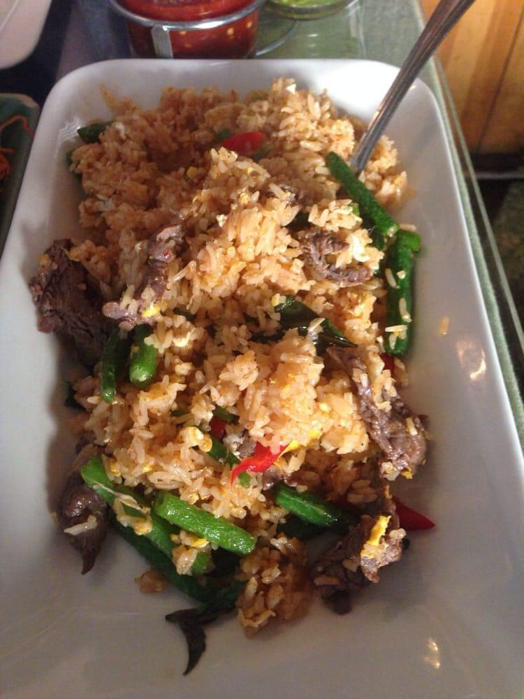 69. Spicy Green Bean Fried Rice · Thai style fried rice with spicy red curry paste, chicken, green bean, bell pepper and basil.