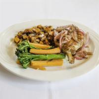 16 oz. Prime Organic Pork Chop · Maple glazed served with sweet potato fries and vegetables.