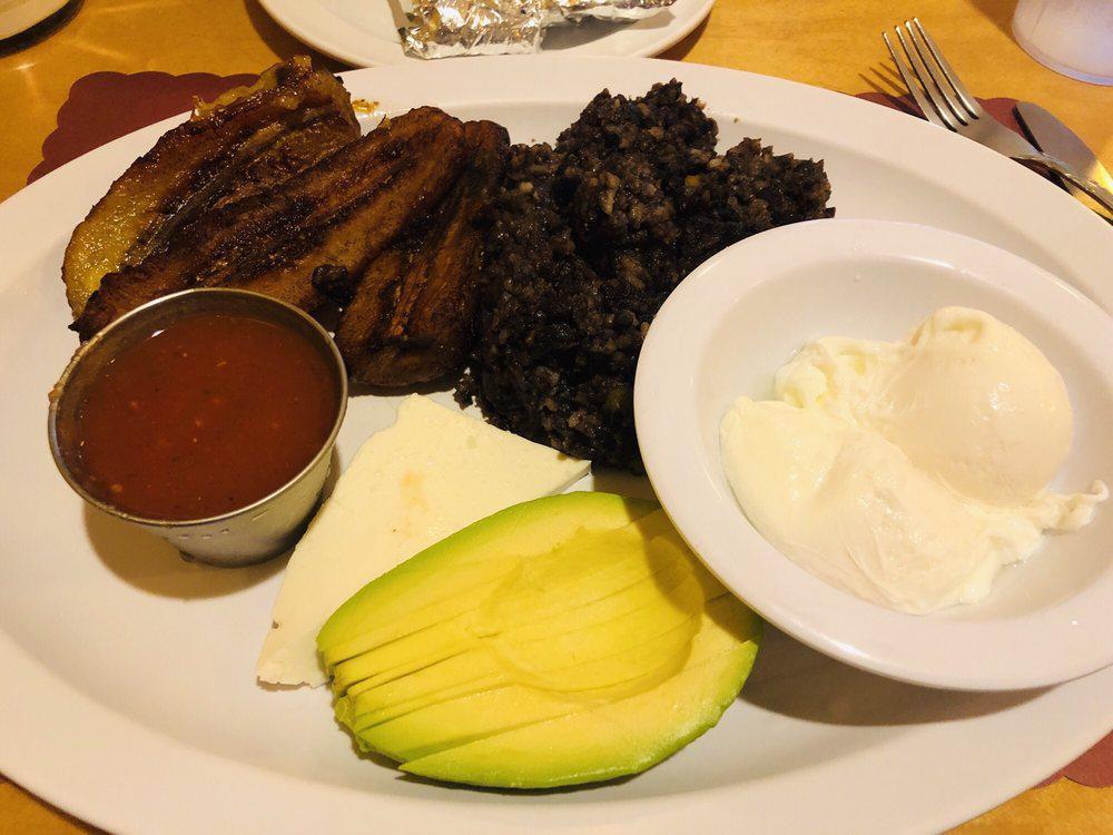 Huevos al Gusto · Eggs, mix of rice and black beans, fresh cheese, sour cream, salsa and choice of avocado or plantain.