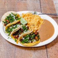 Combo #1 · Its 4 Mexicanos tacos served with rice and beans. Your choice of meat: steak, pork or chicken.