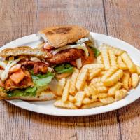 Combo #2 · Mexican sandwich filled with breaded chicken with cheese, mayo, lettuce, avocado, onions, pi...