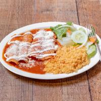 #10. Enchiladas · 4 enchiladas red salsa served with rice and salad.