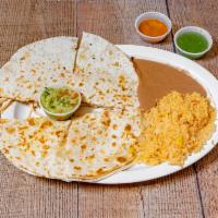 #16. Quesadilla de Lujo · 2 large flour tortillas with cheese and meat. Served with guacamole, rice and beans and your...