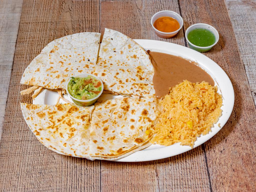 #16. Quesadilla de Lujo · 2 large flour tortillas with cheese and meat. Served with guacamole, rice and beans and your choice of meat: chicken, pork and steak.