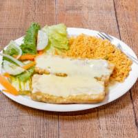 #17. Chimichanga · 2 fried flour tortillas filled with chicken, covered with cheese dip served iwth rice and sa...