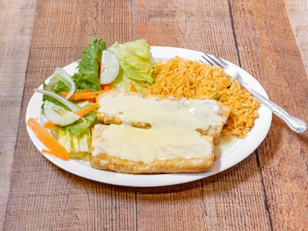#17. Chimichanga · 2 fried flour tortillas filled with chicken, covered with cheese dip served iwth rice and salad.