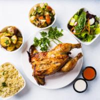 Grilled Chicken Platter · Rotisserie grilled chicken marinated with orange, vinegar, olive oil, thyme, garlic, and spi...