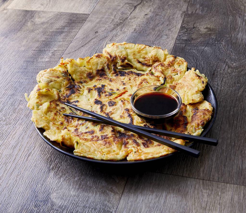 A4. Korean Pancakes · Korean pancakes with vegetables and seafood.