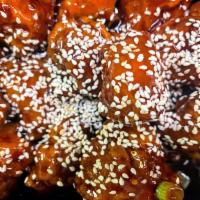 F01. Sesame Chicken · Chunks of boneless chicken deep fried in golden brown then sauteed in sweet and sour sesame ...