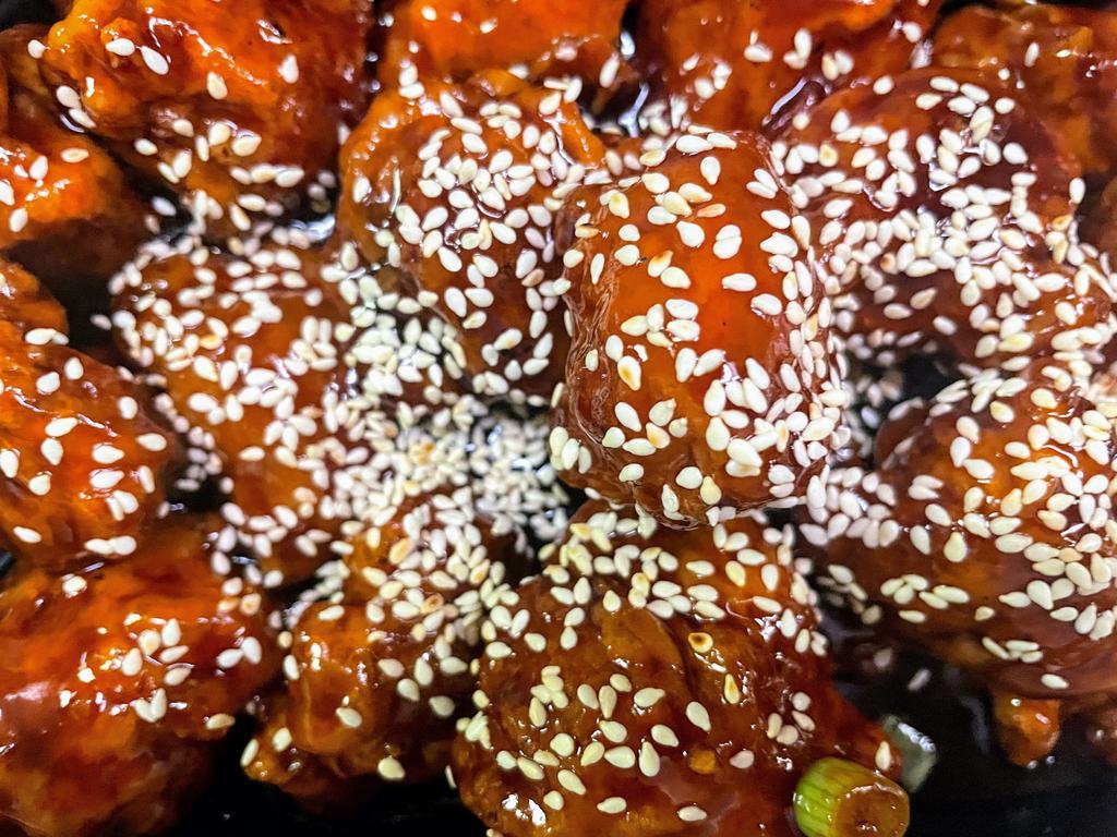 F01. Sesame Chicken · Chunks of boneless chicken deep fried in golden brown then sauteed in sweet and sour sesame sauce. Served with your choice of rice.