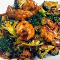 D03. Shrimp Hunan Style · Jumbo shrimp marinated with fresh broccoli,and straw mushrooms in chef's spicy hot pepper ti...