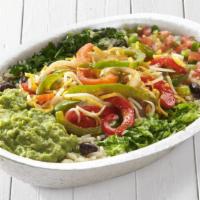 Fajita Veggies Burrito Bowl · Fajita veggies, lettuce, cilantro-lime rice, black beans, guacamole, pico de gallo, shredded...