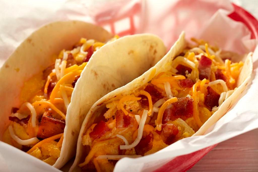 Bacon, Egg and Cheese Taco · Diced bacon, egg, and cheese served on a flour tortilla.