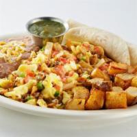 Chicken Chilaquiles · 2 scrambled eggs, shredded chicken, tortillas strips, shredded cheese, and pico de gallo. Se...