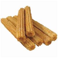 Cinnamon-Sugar Churros · Delicious dough pastries, freshly fried and sprinkled with cinnamon-sugar.